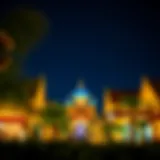 A vibrant view of Global Village at night, showcasing the illuminated attractions and cultural pavilions.